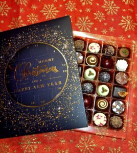 Glitter circle advent calendar with luxury chocolates and Norfolk truffles