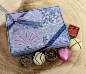 Sara Miller Filigree Tin filled with 12 chocolates
