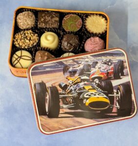 Vintage racing car tin filled with 12 chocolates