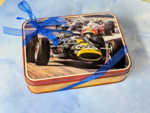 Vintage racing car tin filled with 12 chocolates