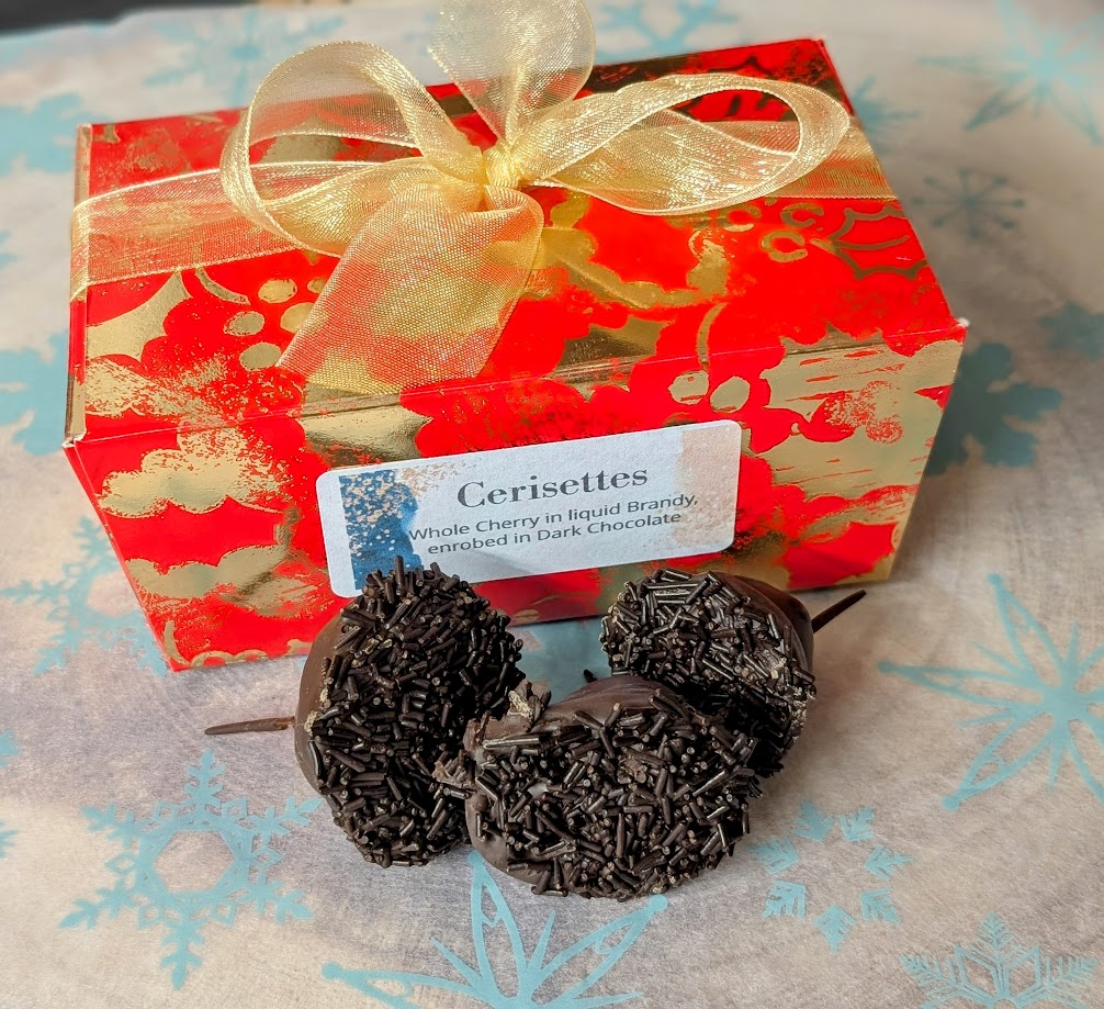 Box of Cerisettes - whole cherries in liquid brandy in dark Chocolate