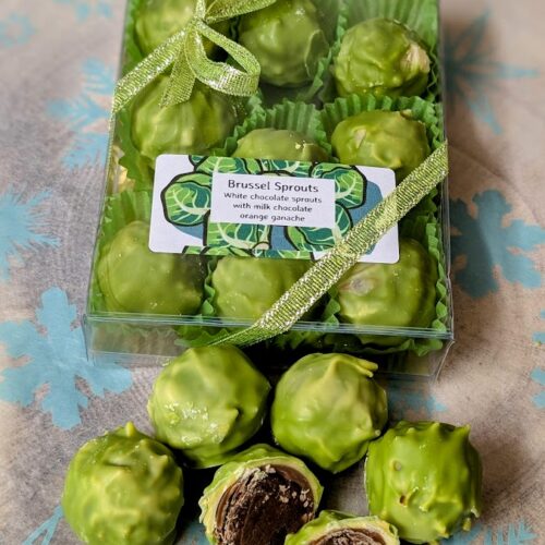 White chocolate sprouts filled with milk chocolate orange ganache